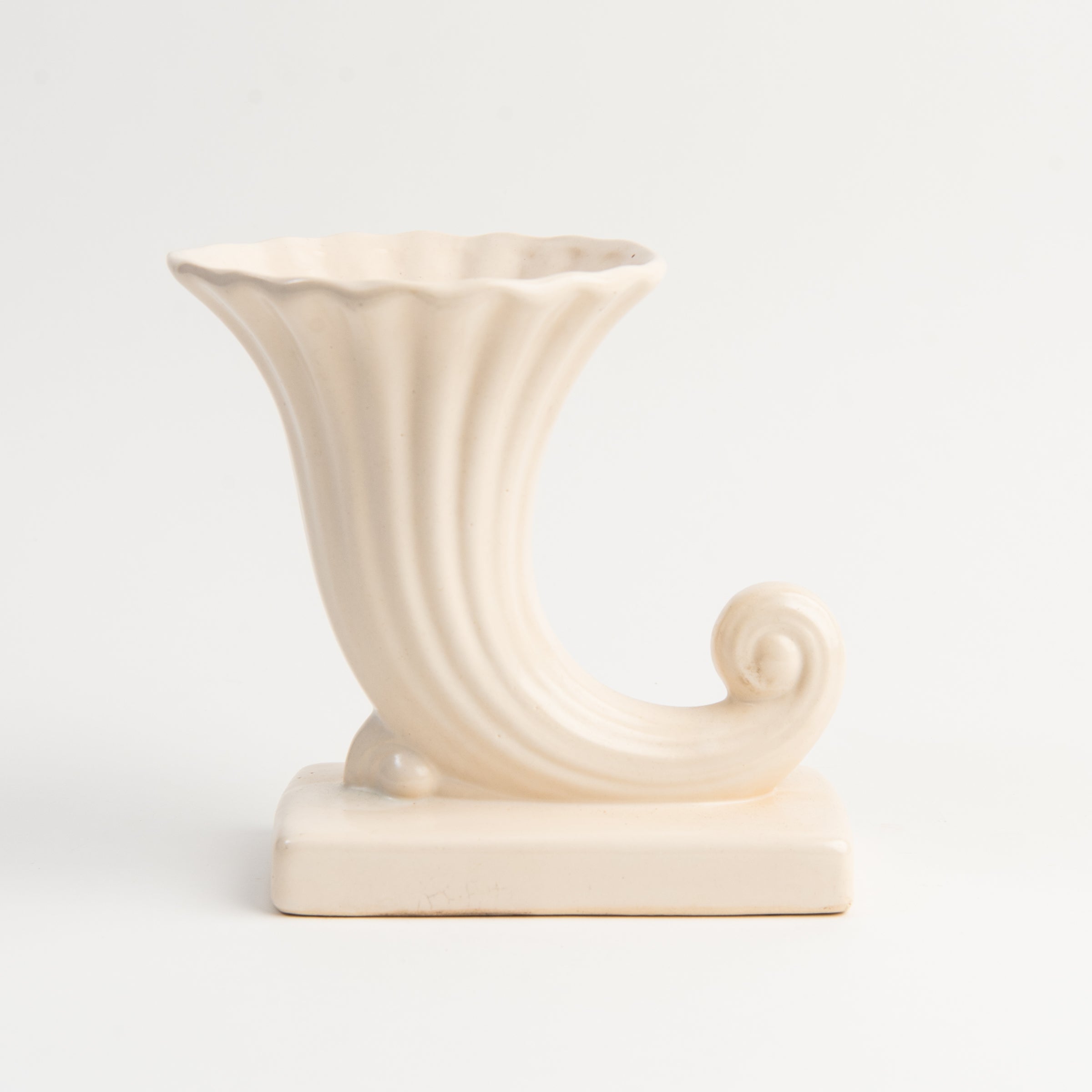 Vintage McCoy Vase on a white background at Addison West