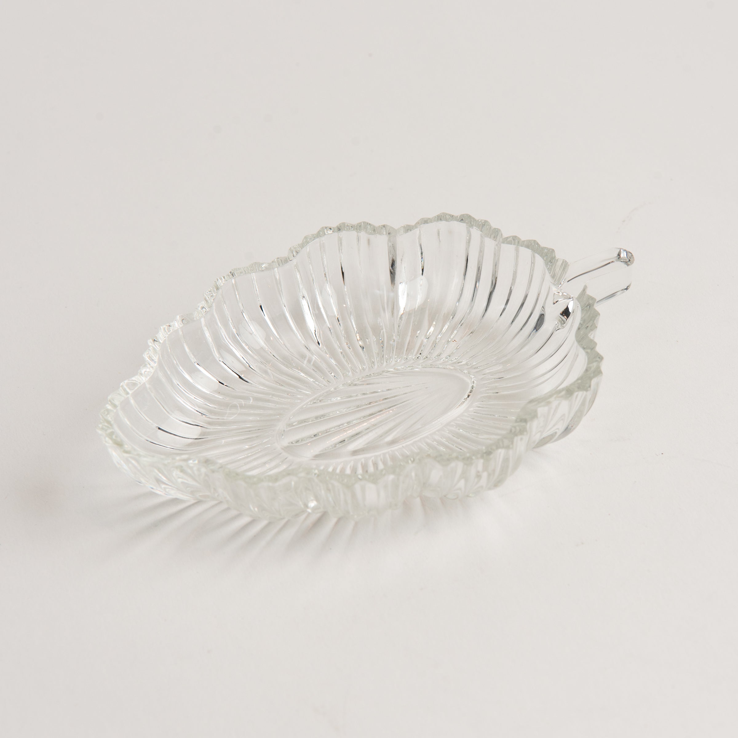 Vintage 30s Glass Leaf Dish on a white background at Addison West