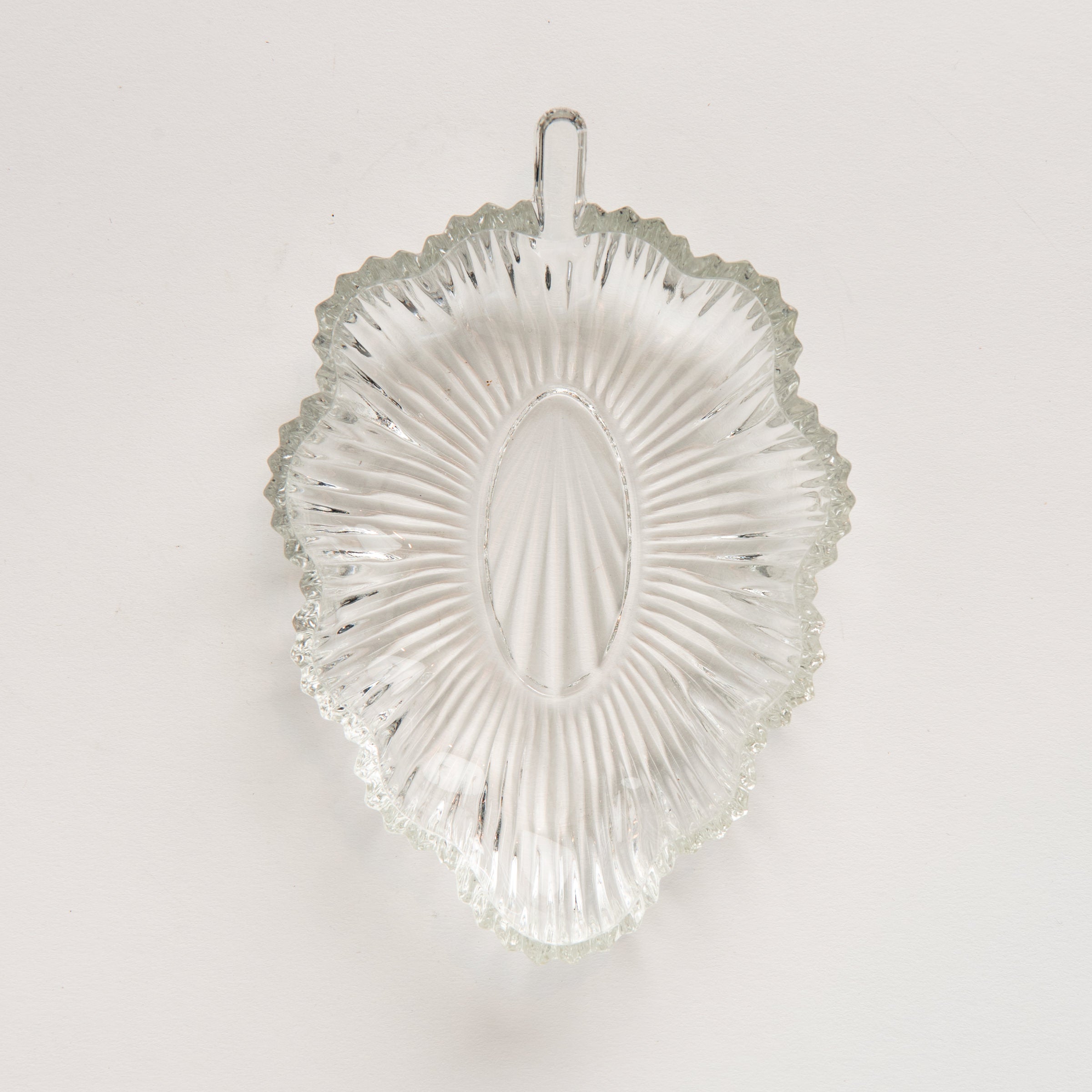 Vintage 30s Glass Leaf Dish on a white background at Addison West