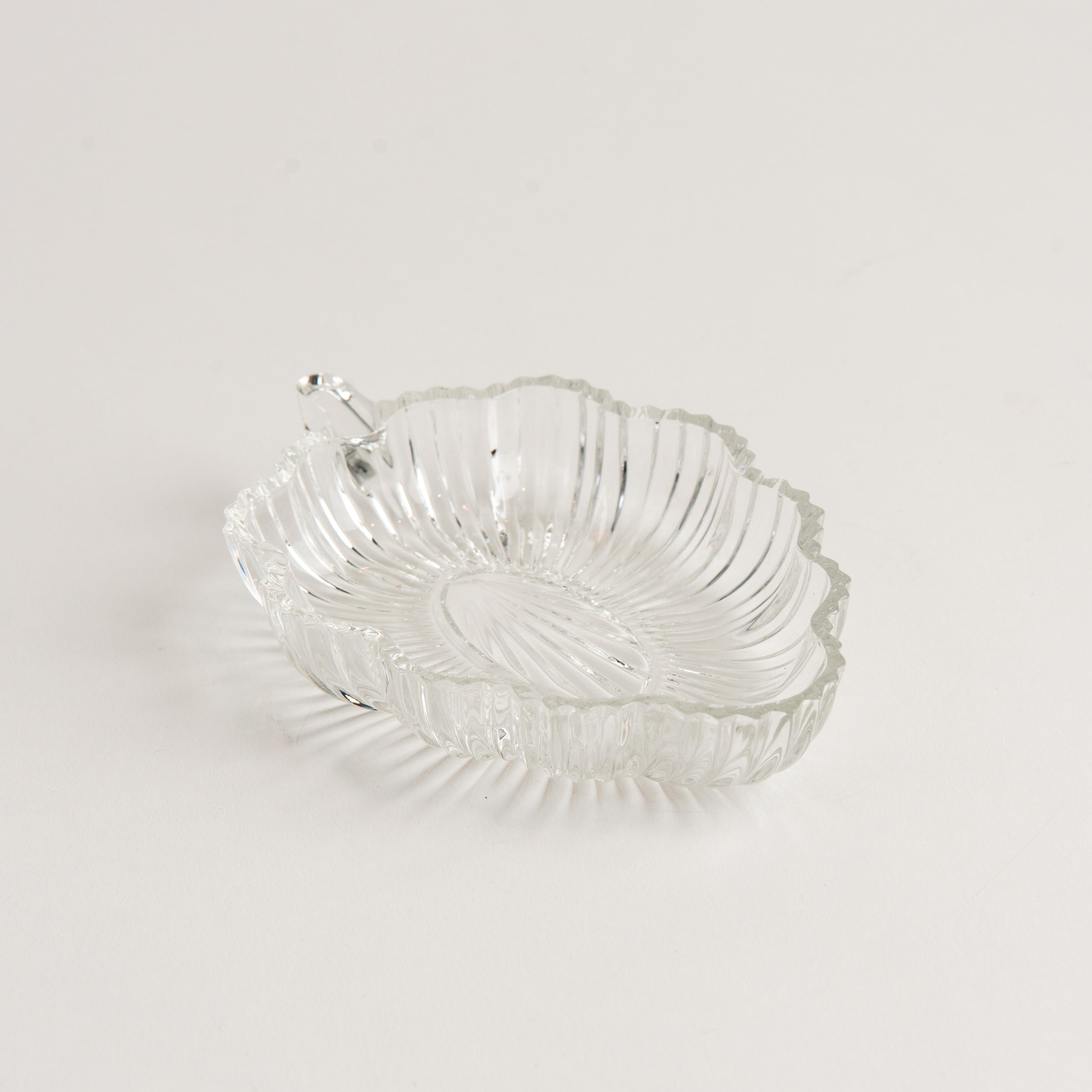 Vintage 30s Glass Leaf Dish on a white background at Addison West