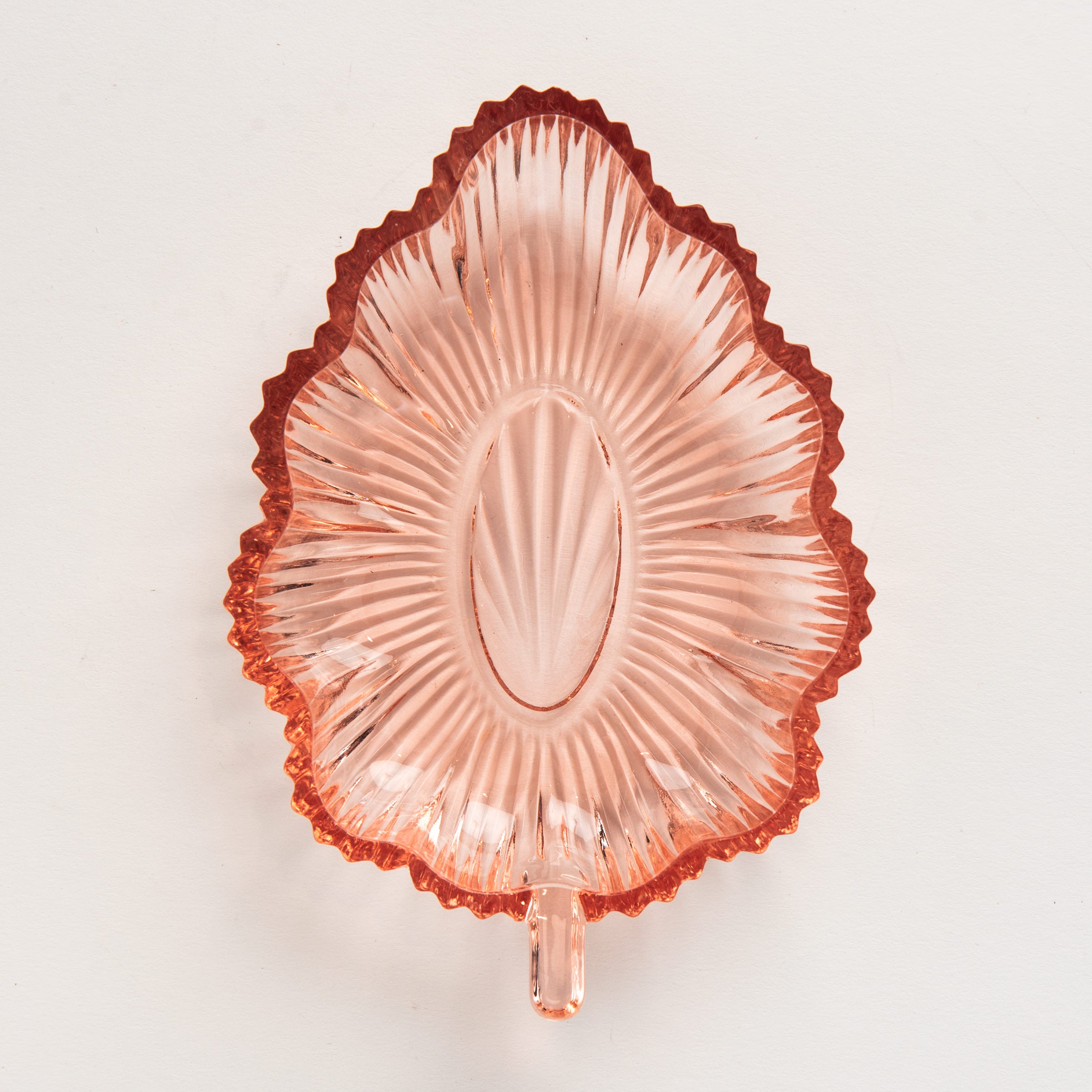 Vintage 30s Glass Leaf Dish in Blush on a white background at Addison West