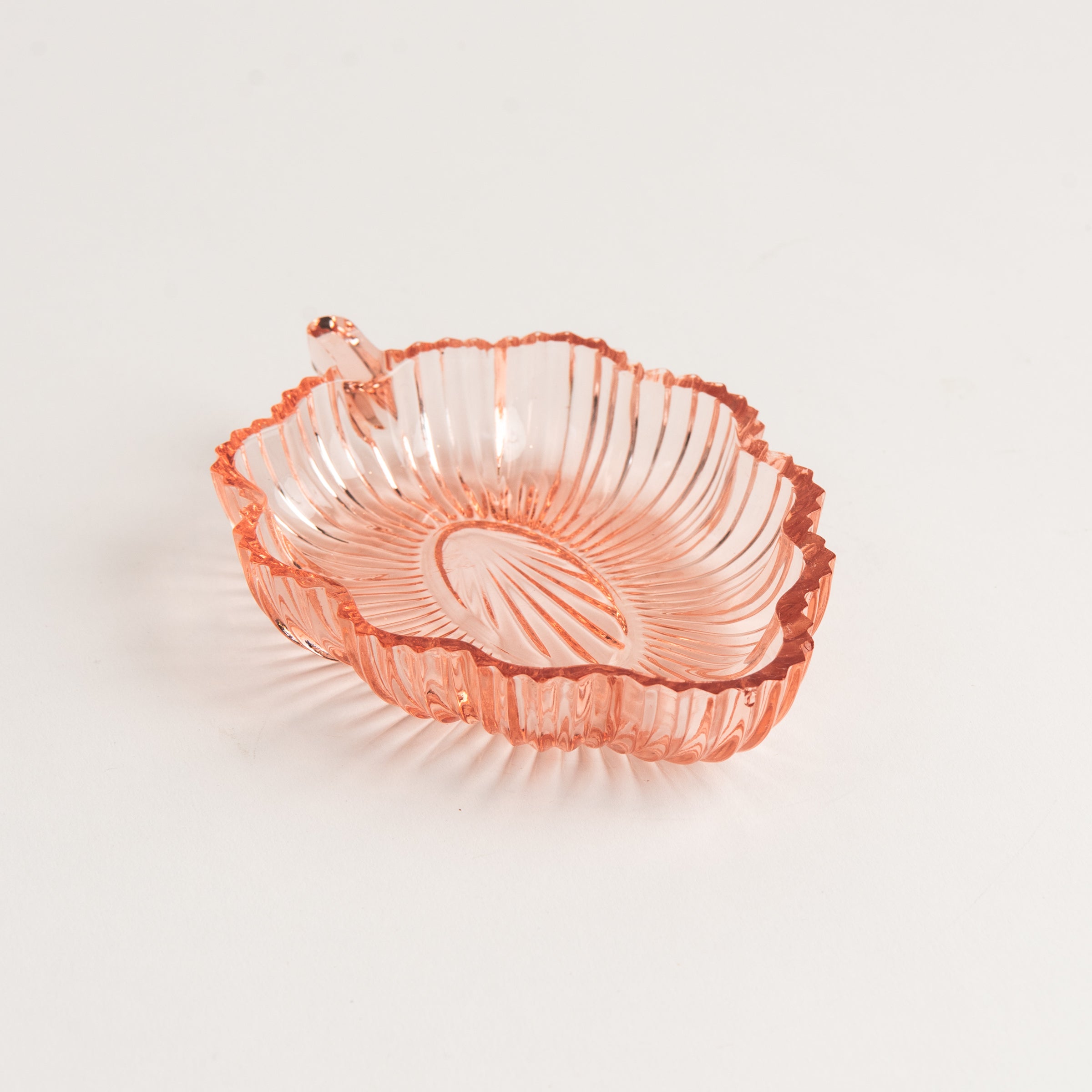 Vintage 30s Glass Leaf Dish in Blush on a white background at Addison West