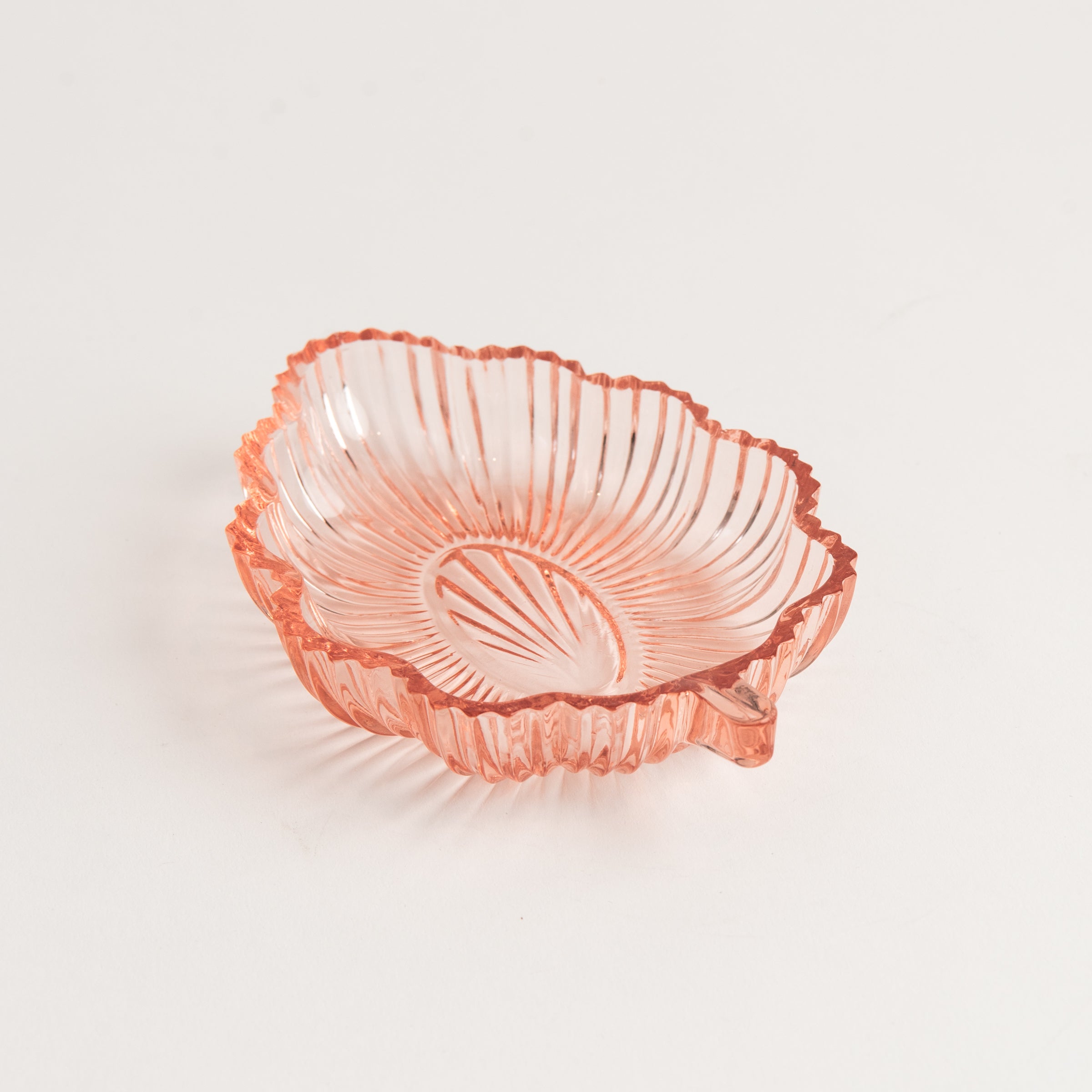 Vintage 30s Glass Leaf Dish in Blush on a white background at Addison West