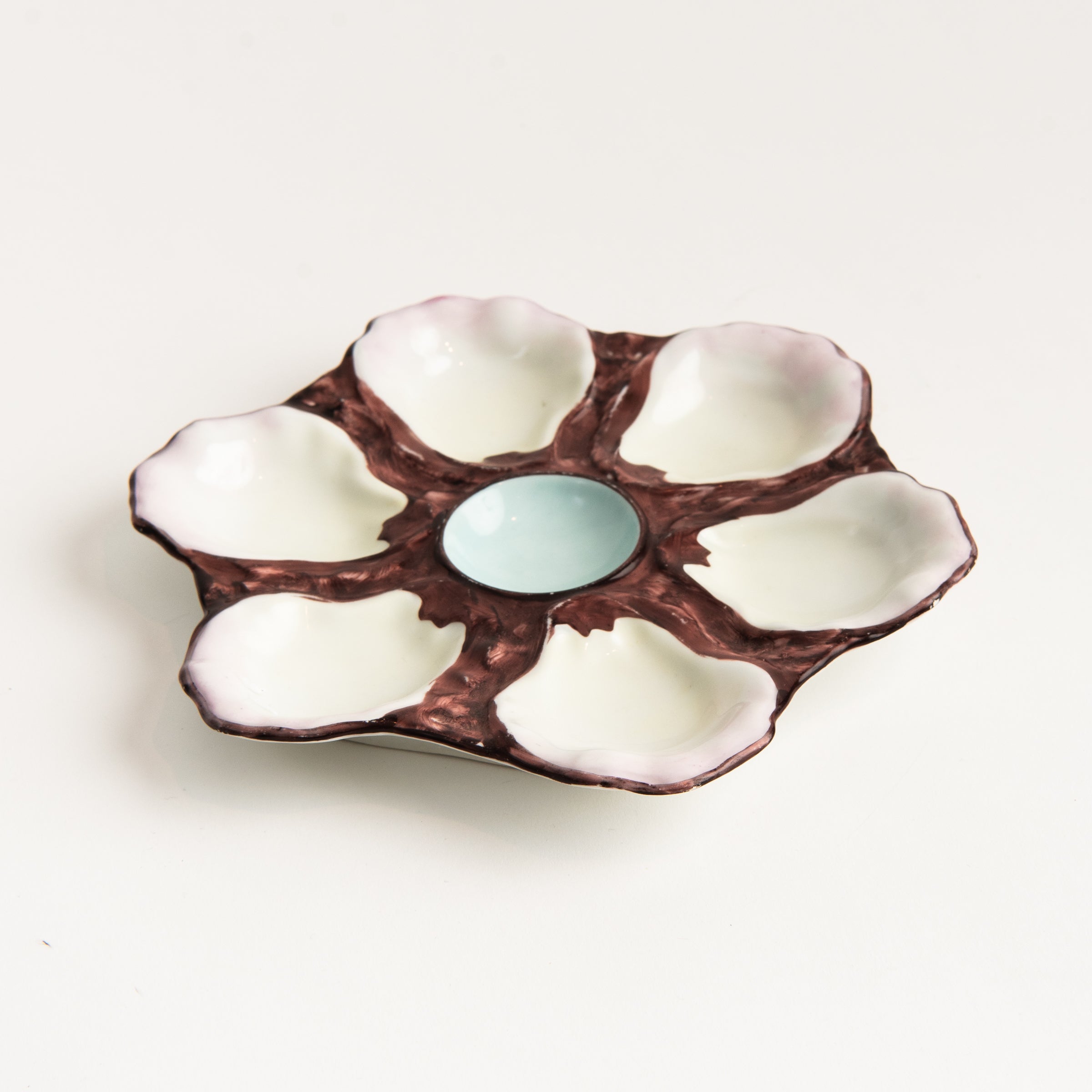 Vintage Seaweed Glaze Oyster Plate on a white background at Addison West