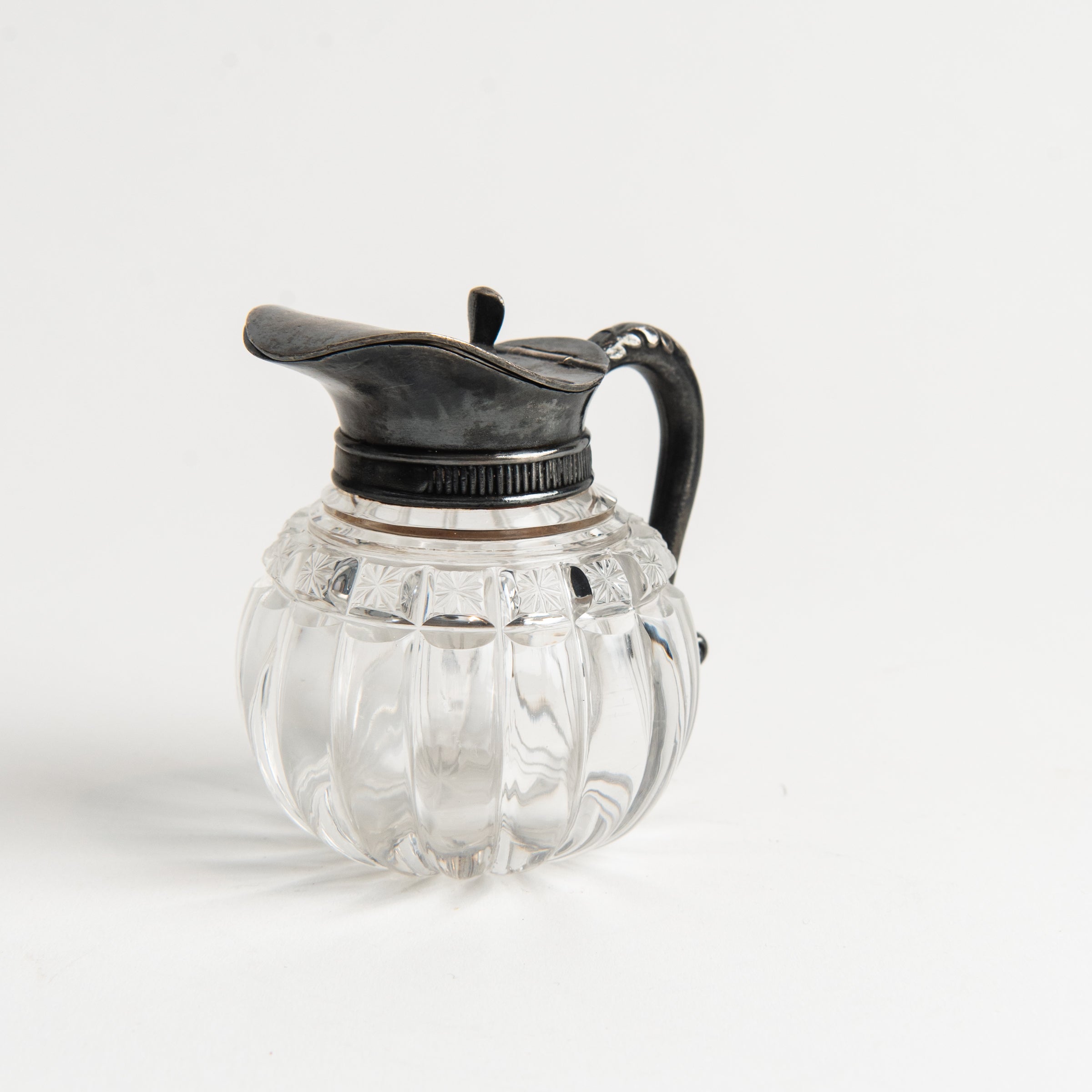 Vintage Round Victorian Syrup Pitcher #2 on a white background at Addison West
