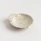 Vintage French Silver Shell Tray with Glass Insert on a white background at Addison West