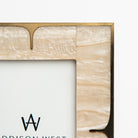 Mother of Pearl and Brass Picture Frame on a white background at Addison West