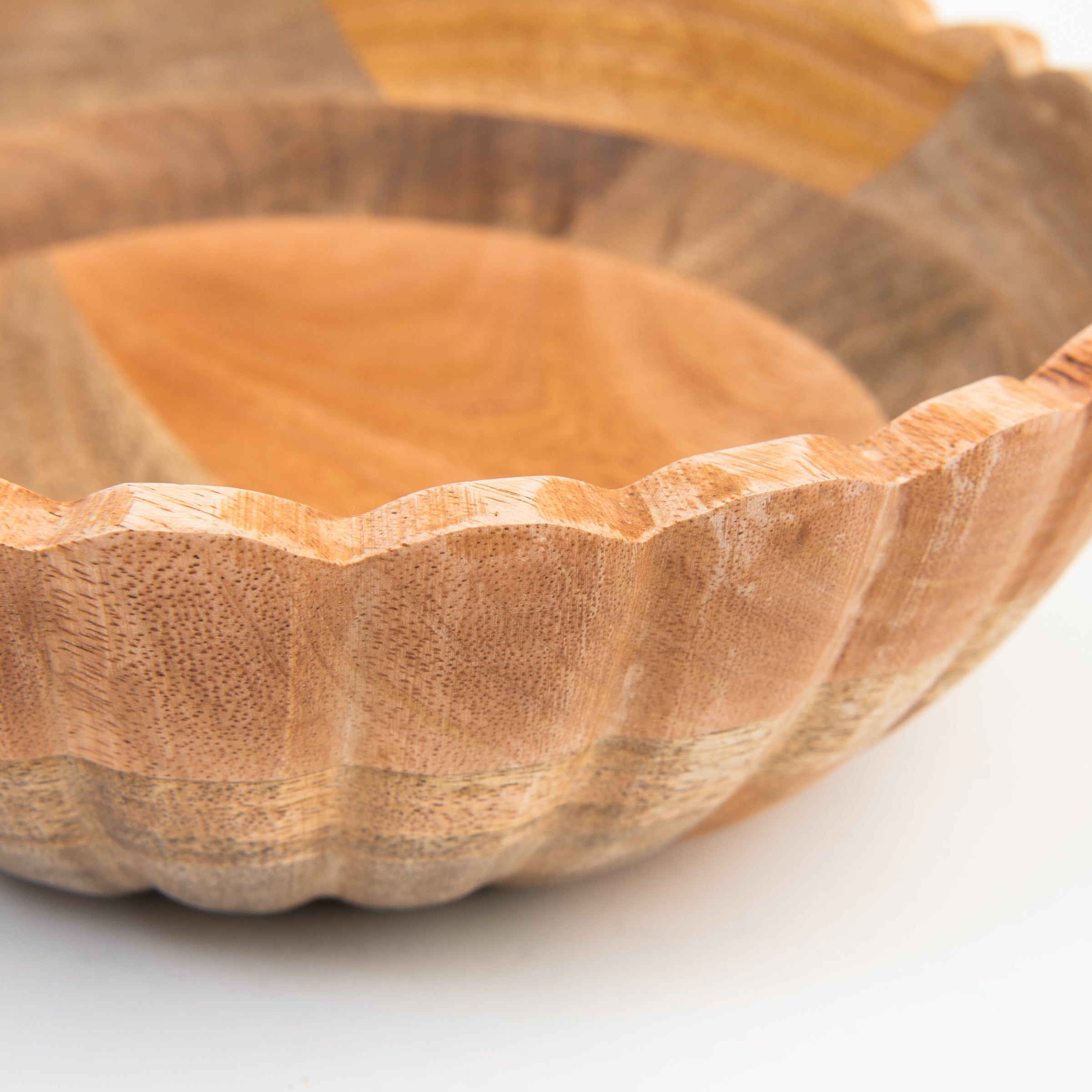 Scalloped Edge Mango Wood Bowl on a white background at Addison West