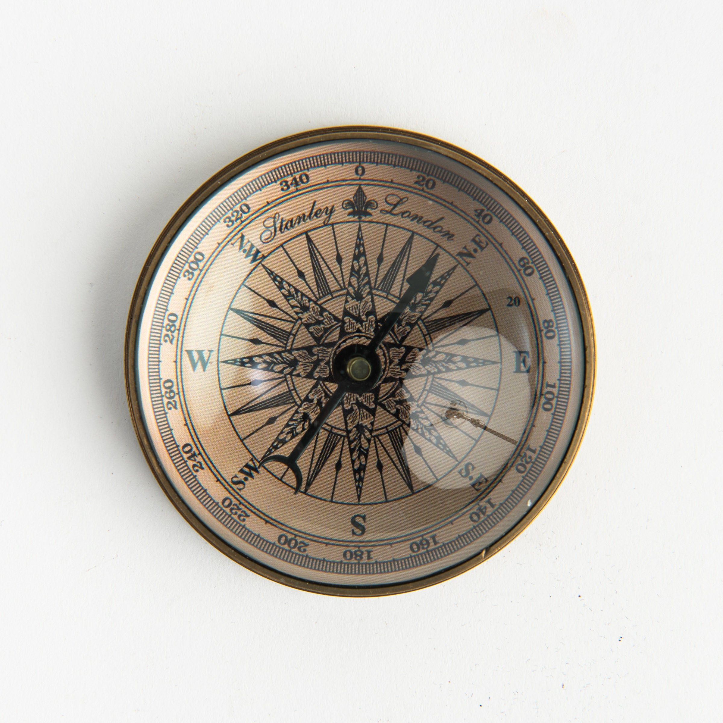 Compass Paperweight on a white background at Addison West