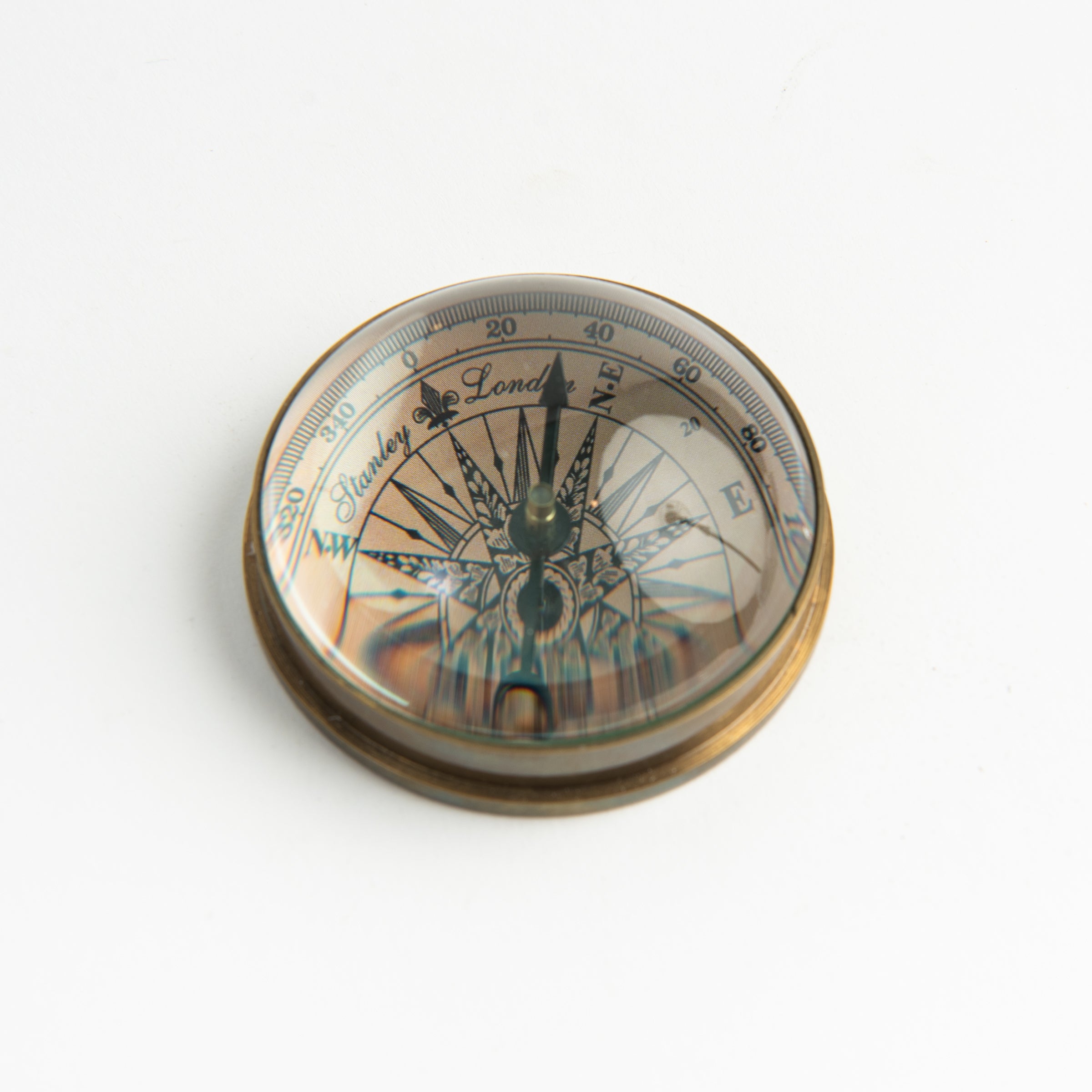 Compass Paperweight on a white background at Addison West