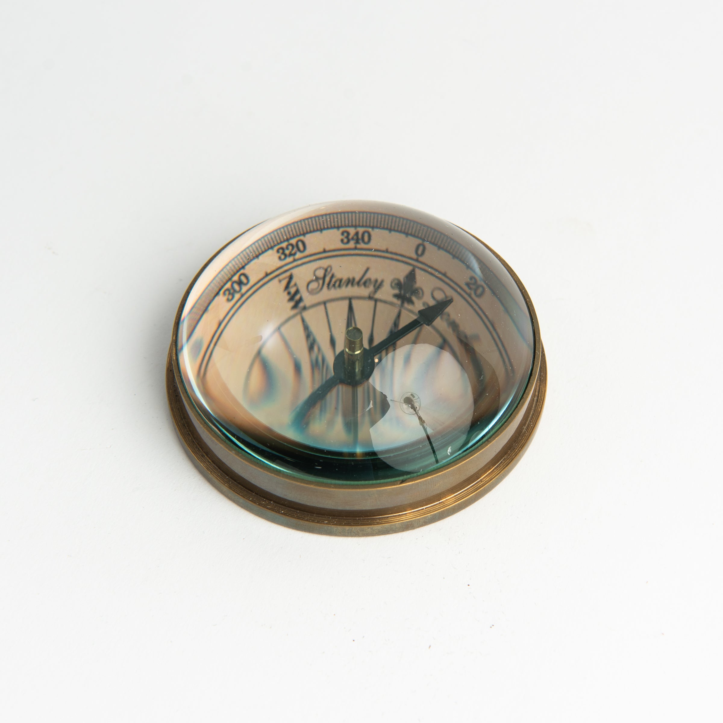 Compass Paperweight on a white background at Addison West