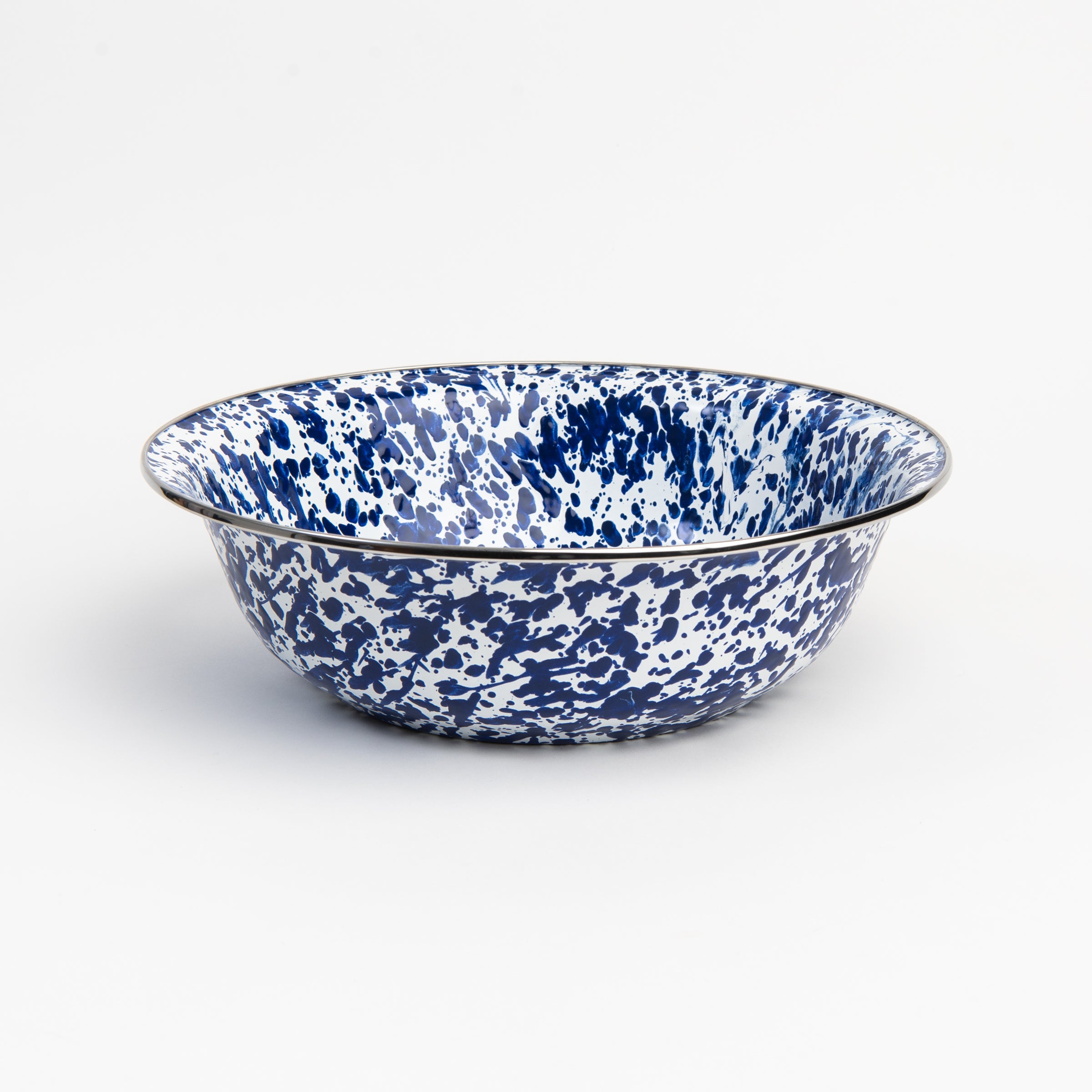 Cobalt Swirl Enamelware Serving Bowl on a white background at Addison West