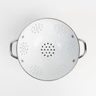 Large White Enamelware Colander on a white background at Addison West