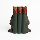 Vintage Cast Iron Flower Bookends on a white background at Addison West
