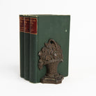 Vintage Cast Iron Flower Bookends on a white background at Addison West
