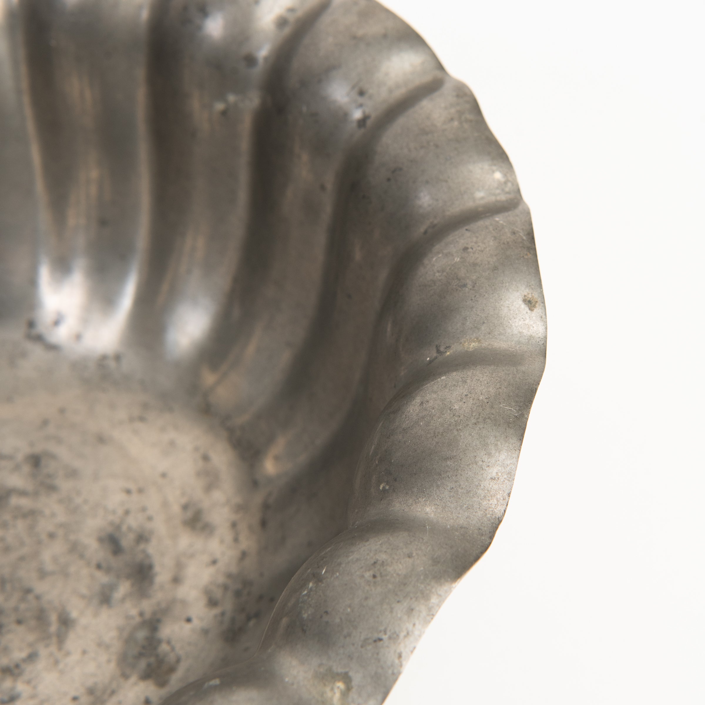 Vintage Scalloped Pewter Bowl on a white background at Addison West