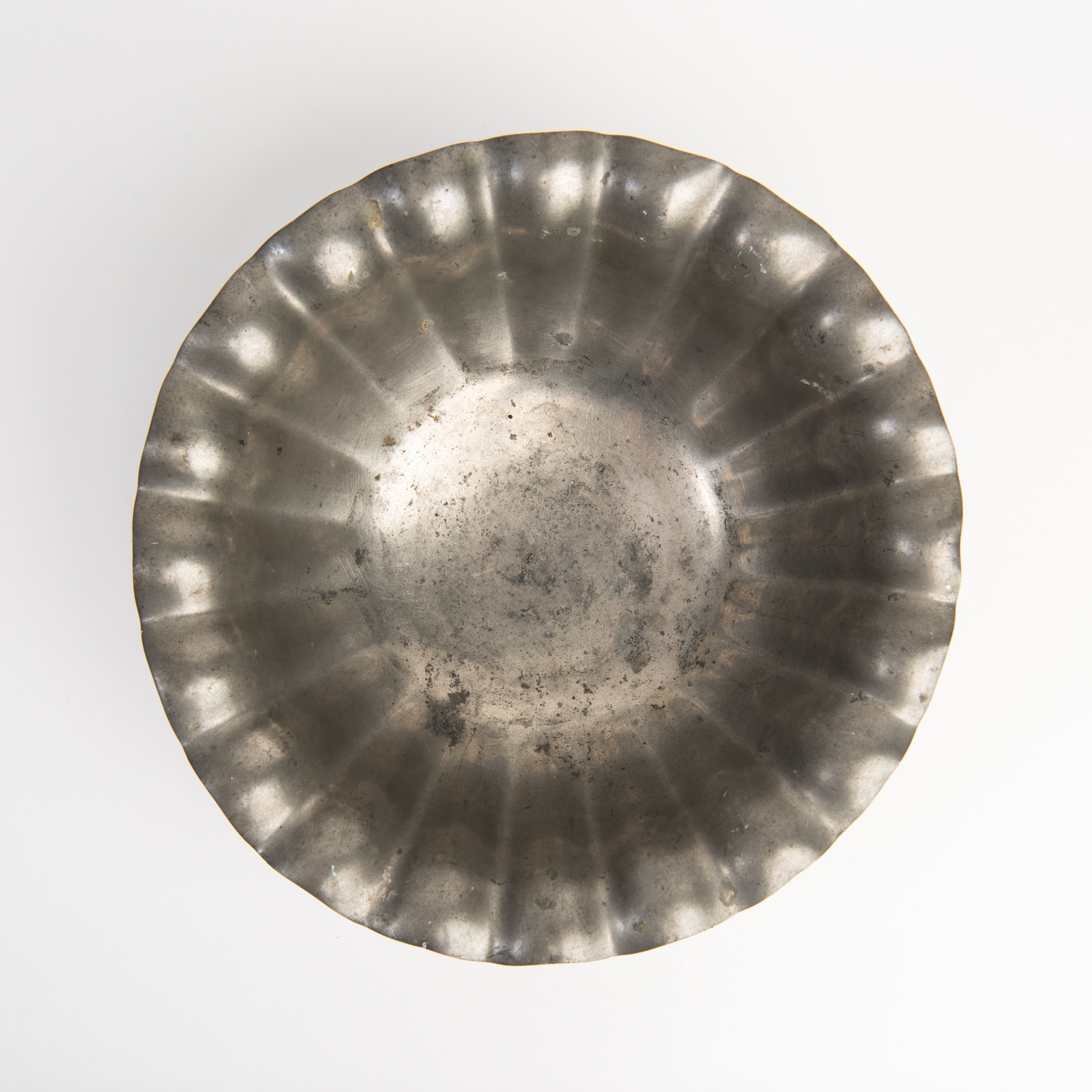 Vintage Scalloped Pewter Bowl on a white background at Addison West