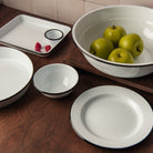 Vintage Enamelware on a table at Addison West