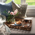 Tulum Striped Throw in Blue, Ingrid Rattan Rectangular Tray,  Chelsea Optic Posy Vase, on a window seat at Addison West