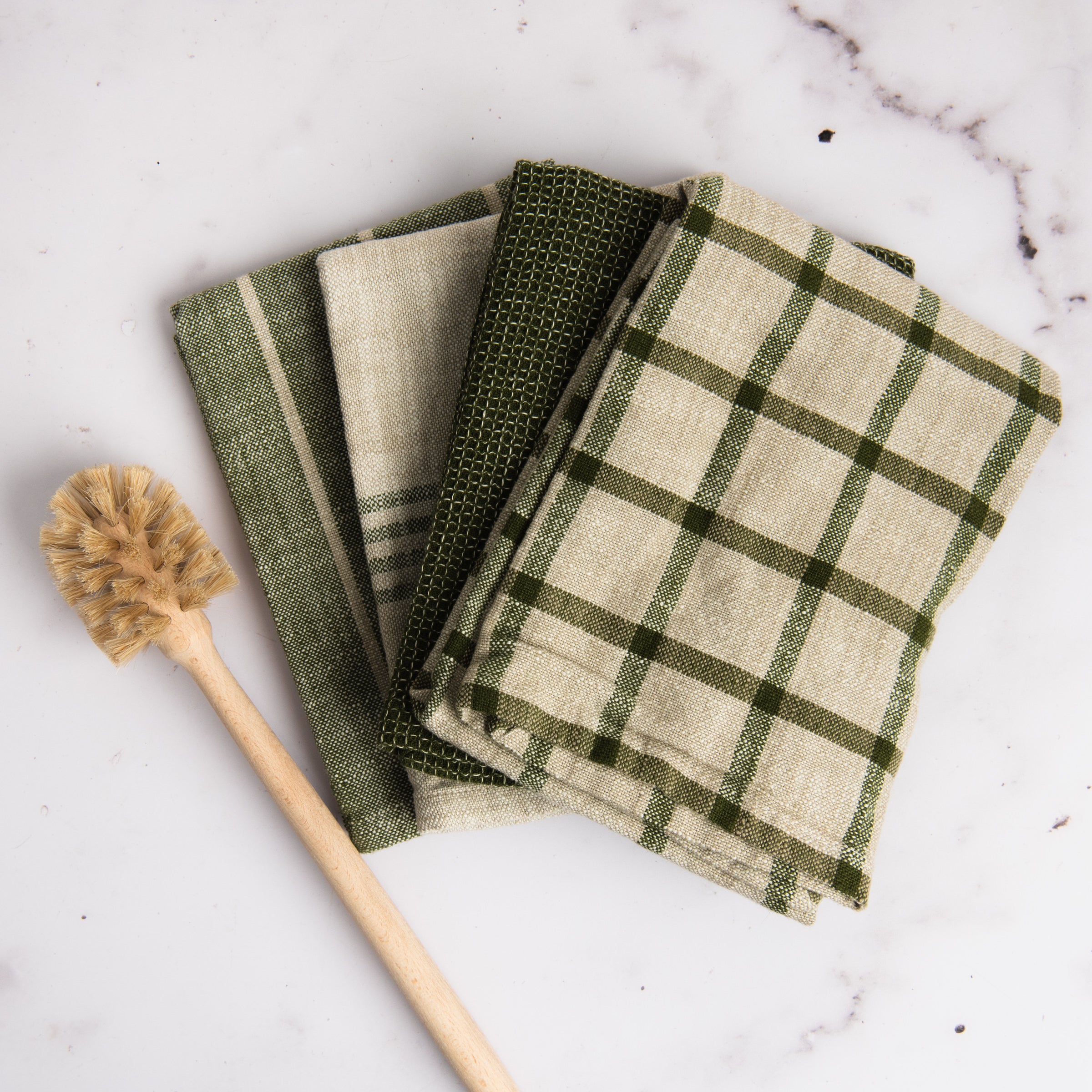 Olive Canyon Woven Dishtowel, Set of 4 on a table at Addison West