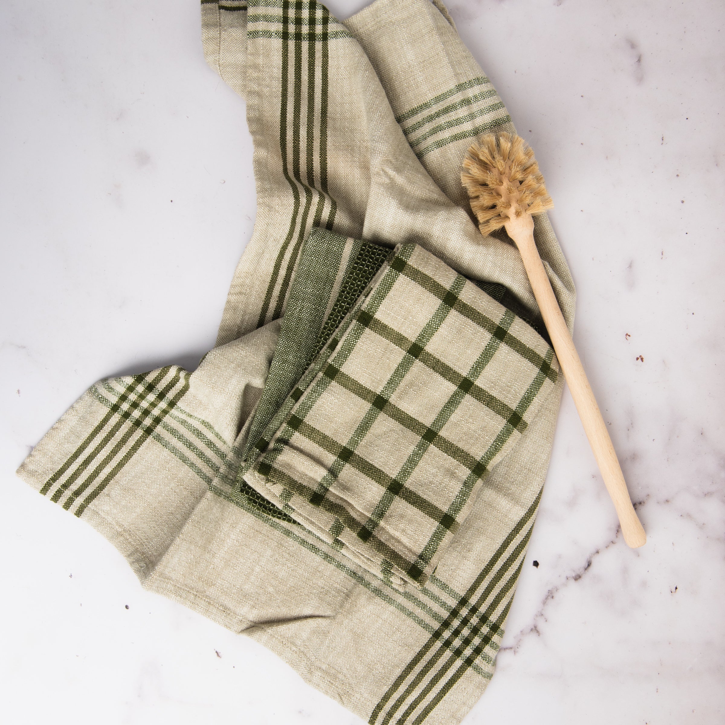 Olive Canyon Woven Dishtowel, Set of 4 on a table at Addison West