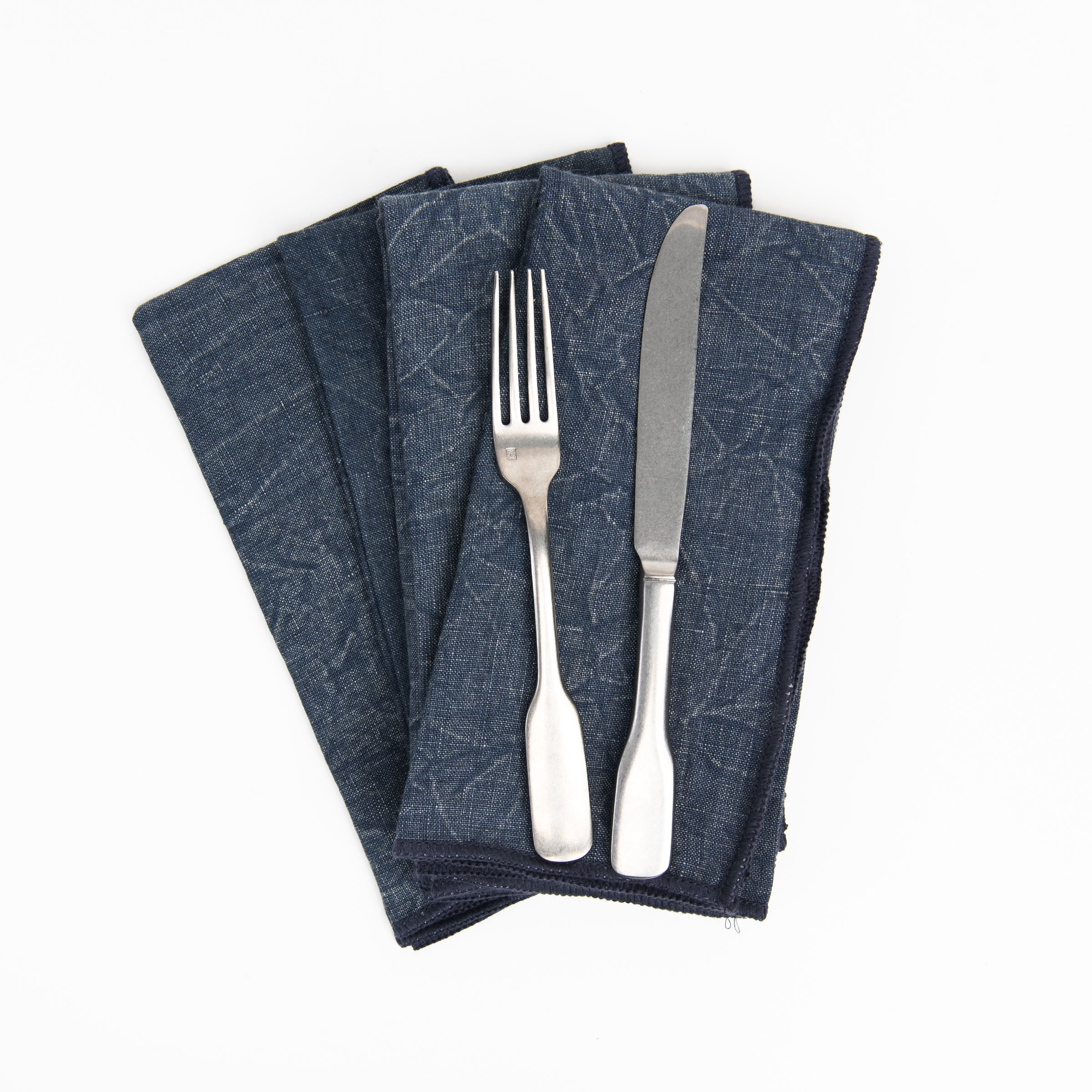 Stonewash Navy Linen Napkins, Set of 4 on a white background at Addison West