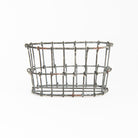 Wire Basket Lotion & Soap Bottle Holder on a white background at Addison West