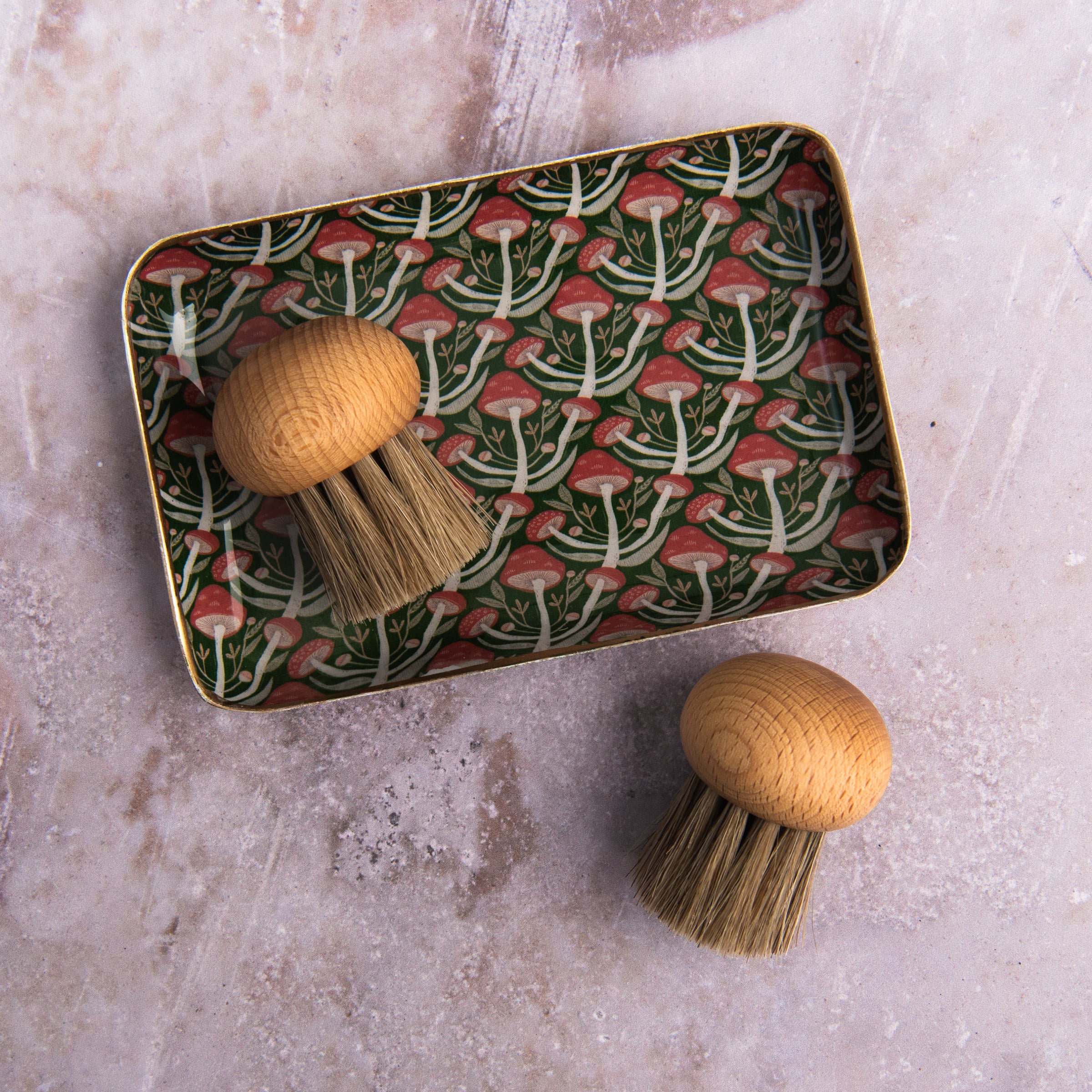 Redecker Mushroom Brush on a table at Addison West