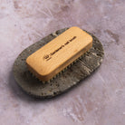 Redecker Gardener's Nail Brush on a table at Addison West