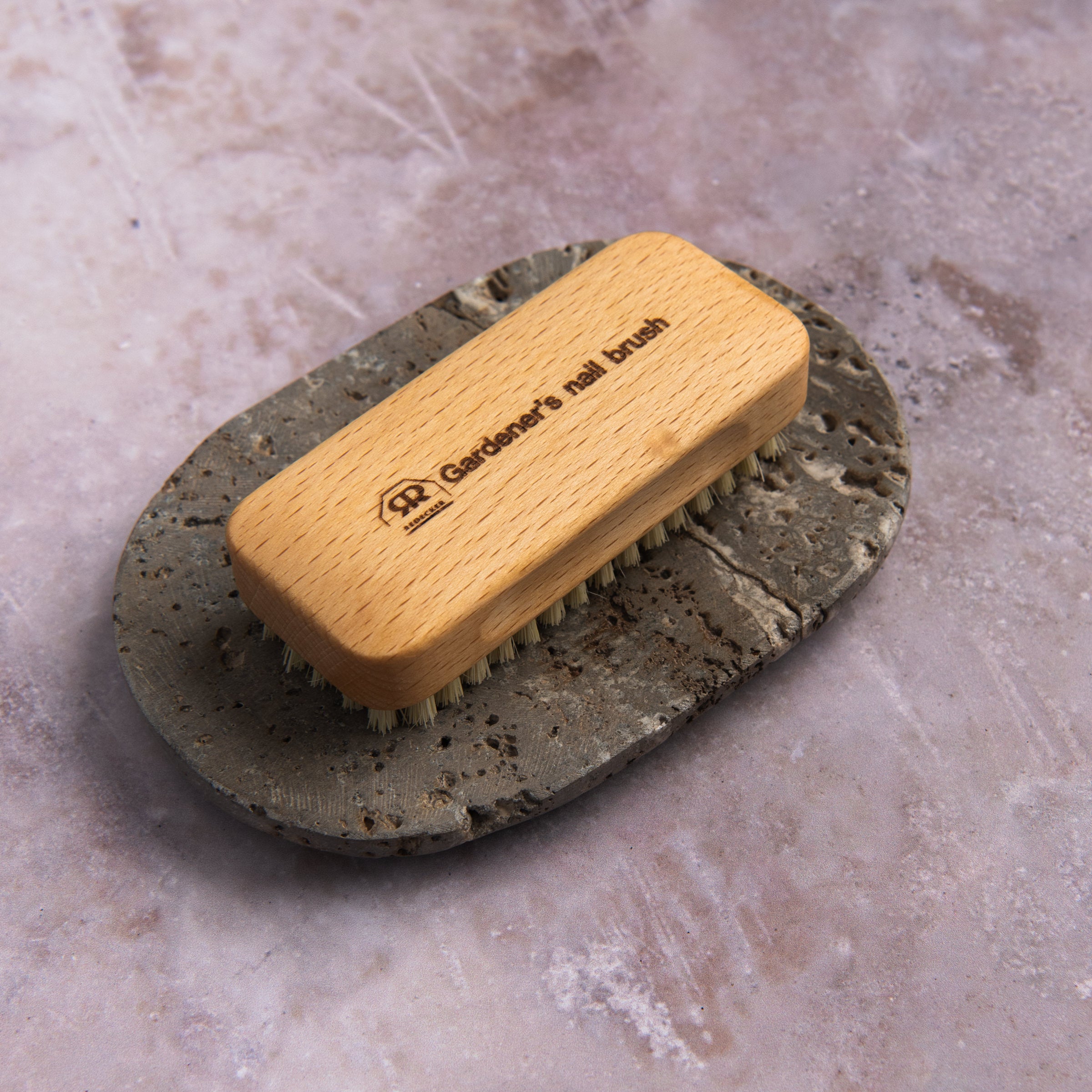 Redecker Gardener's Nail Brush on a table at Addison West