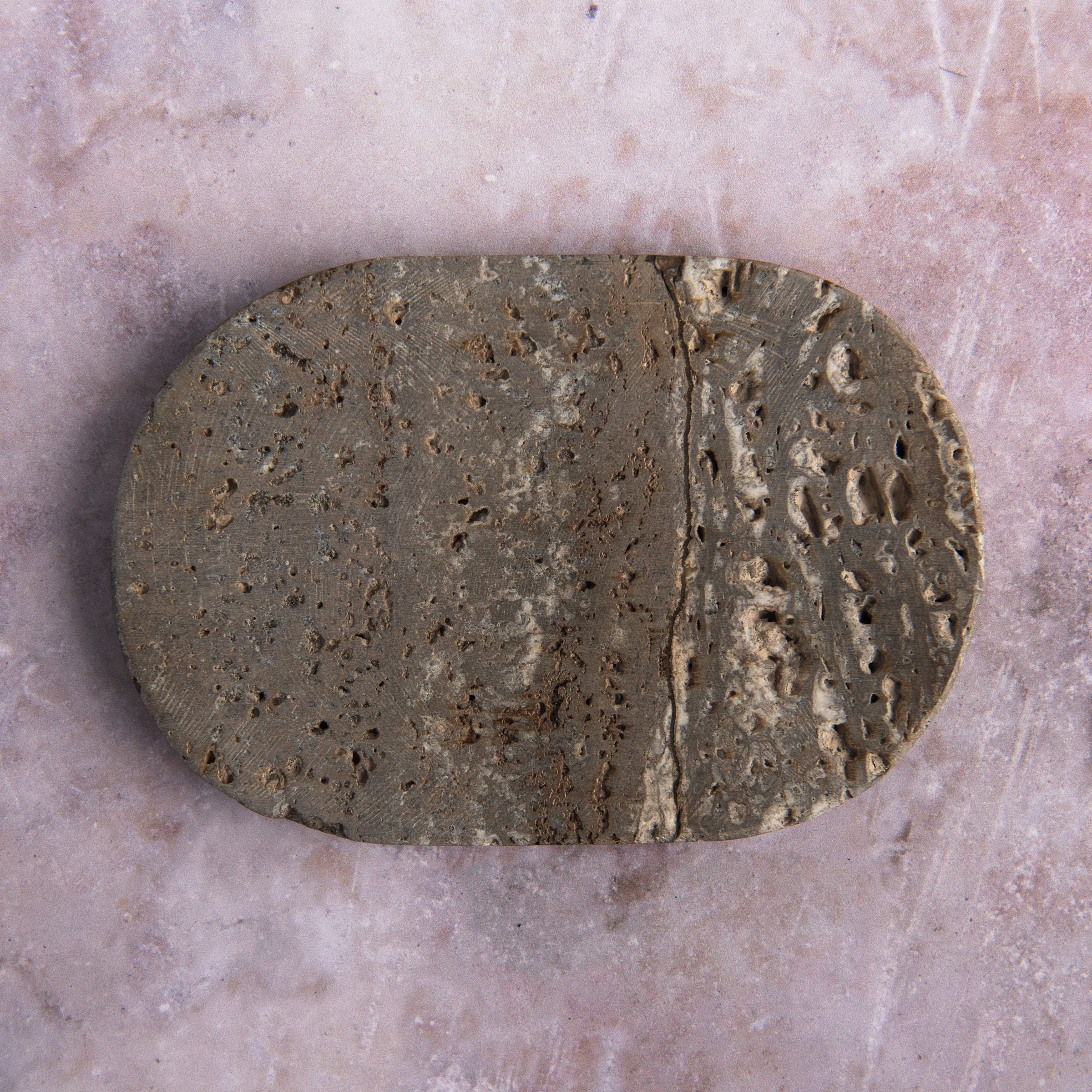 Travertine Soap Dish on a table at Addison West