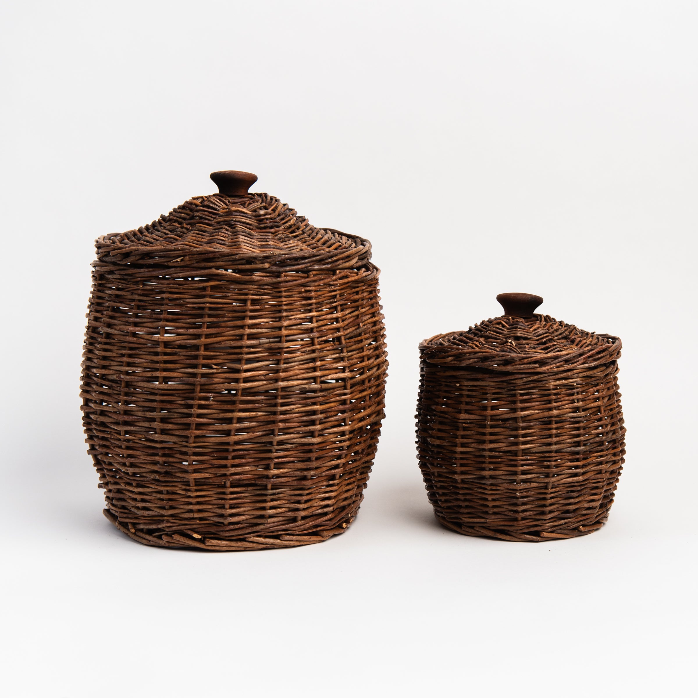 Wicker Storage Baskets With Lids on a white background at Addison West