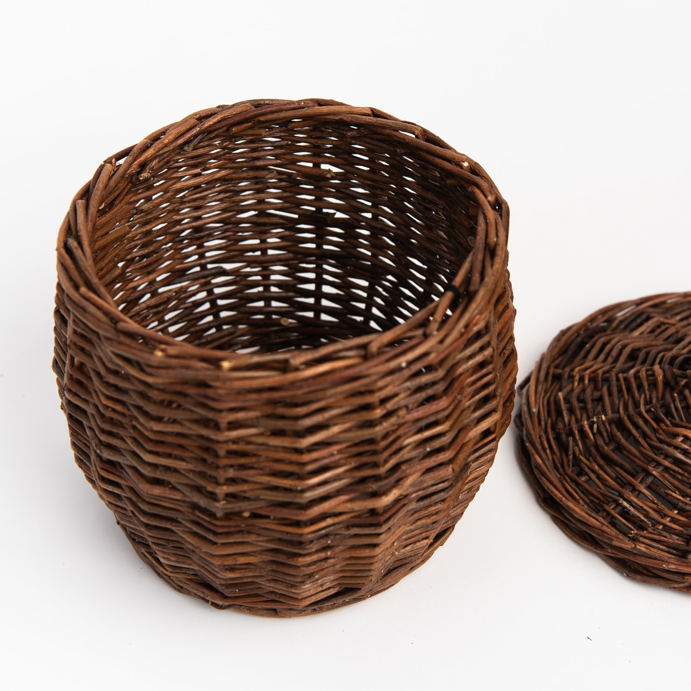 Wicker Storage Baskets With Lids on a white background at Addison West