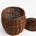 Wicker Storage Baskets With Lids on a white background at Addison West