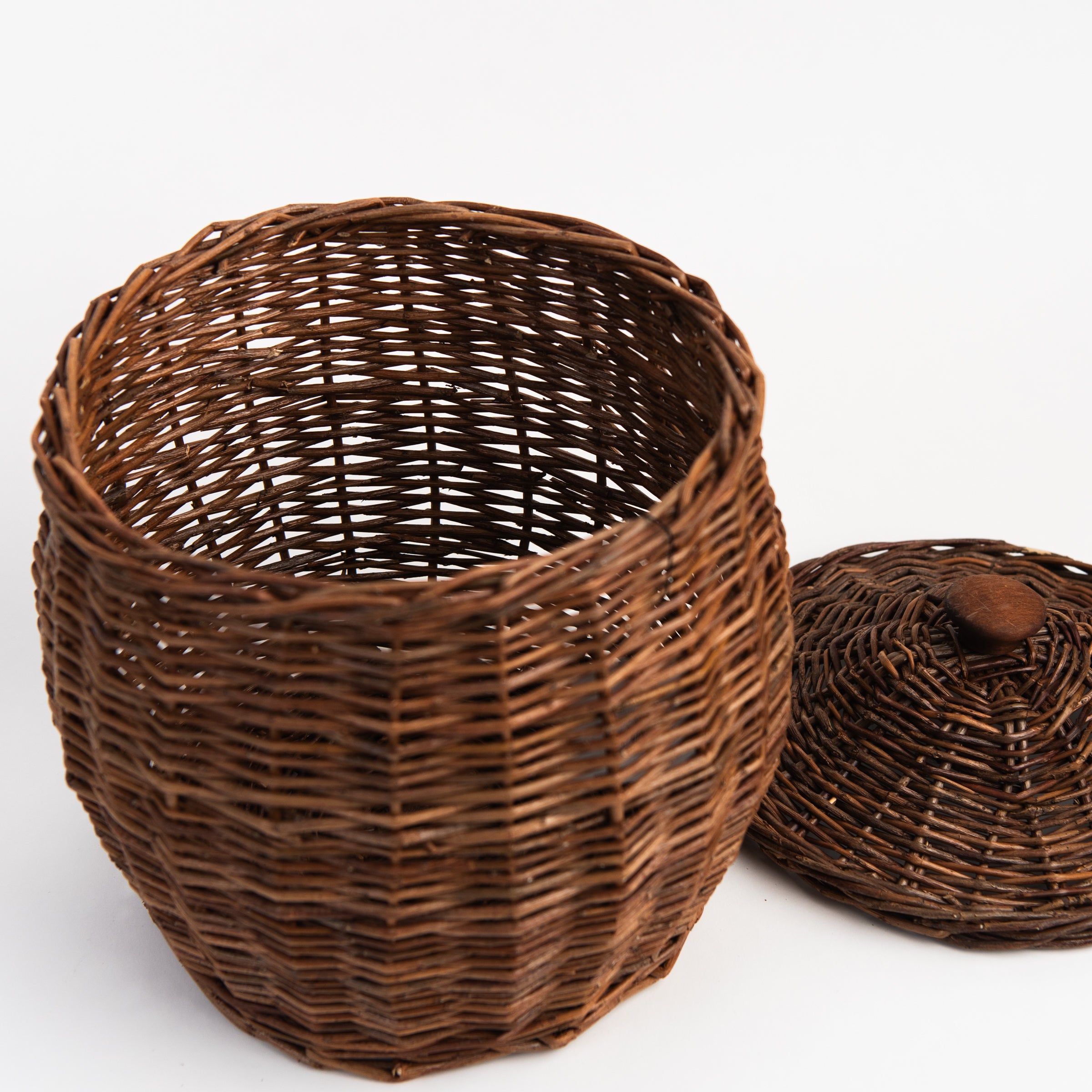 Wicker Storage Baskets With Lids on a white background at Addison West