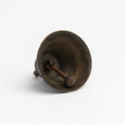 Vintage Bronze Colonial Bell on a white background at Addison West