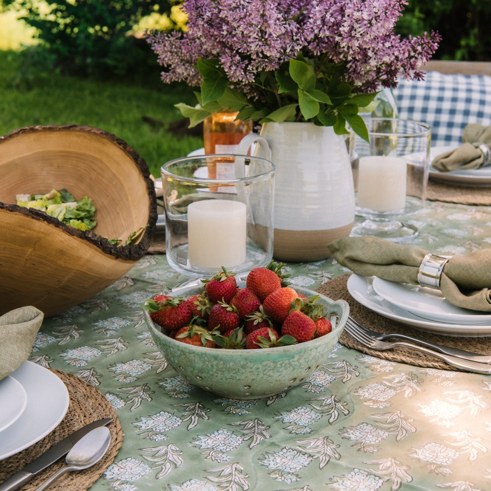 Blue-Green Glazed Berry Bowl on an outdoor table at Addison West