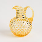 Hobnail Glass Pitcher, Limoncello on a white background at Addison West