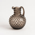 Hobnail Glass Pitcher in Smoky Amaro on a white background at Addison West
