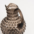 Hobnail Glass Pitcher in Smoky Amaro on a white background at Addison West