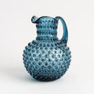 Hobnail Glass Pitcher in Midnight Blue on a white background at Addison West