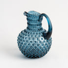 Hobnail Glass Pitcher in Midnight Blue on a white background at Addison West