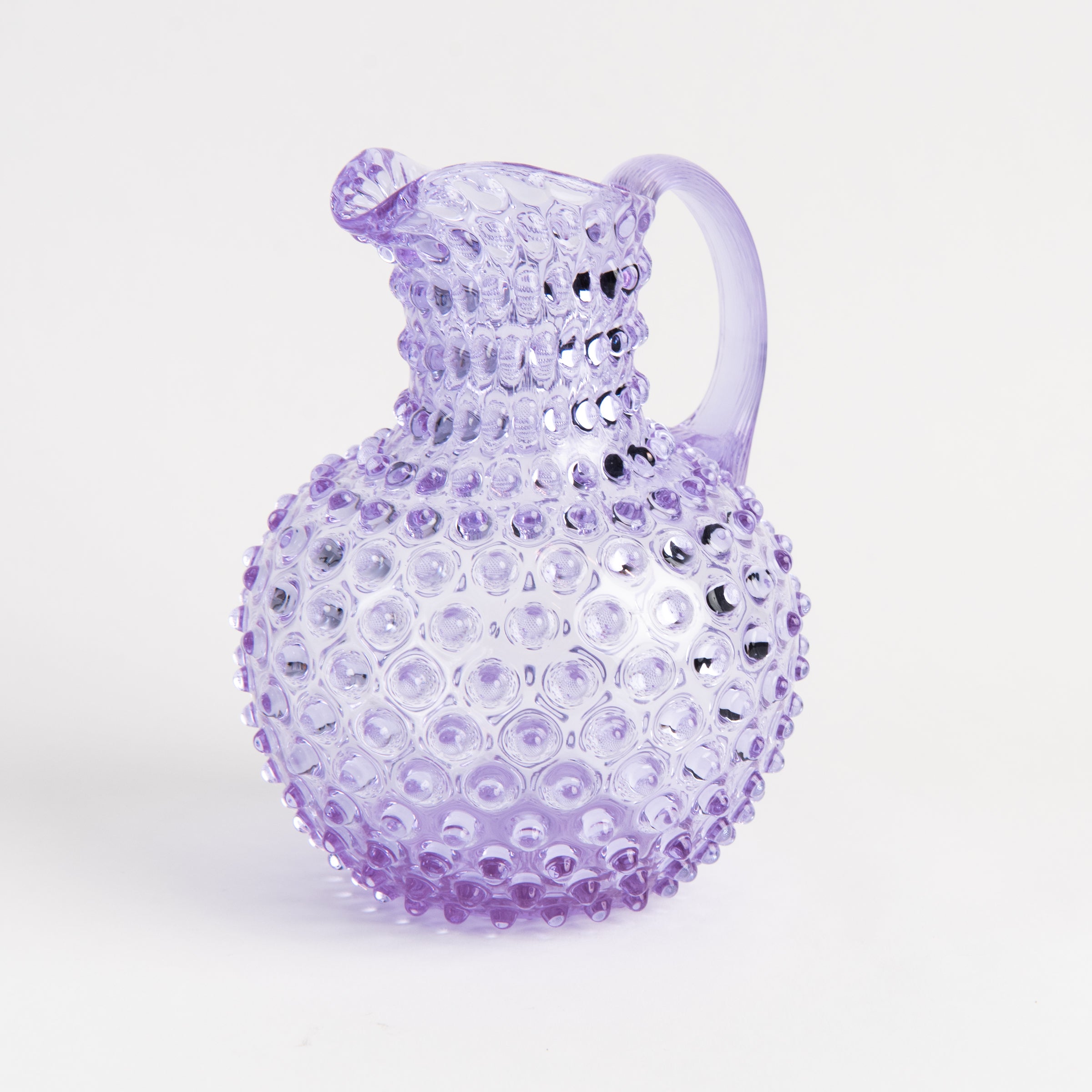Hobnail Glass Pitcher in Lilac Bloom on a white background at Addison West