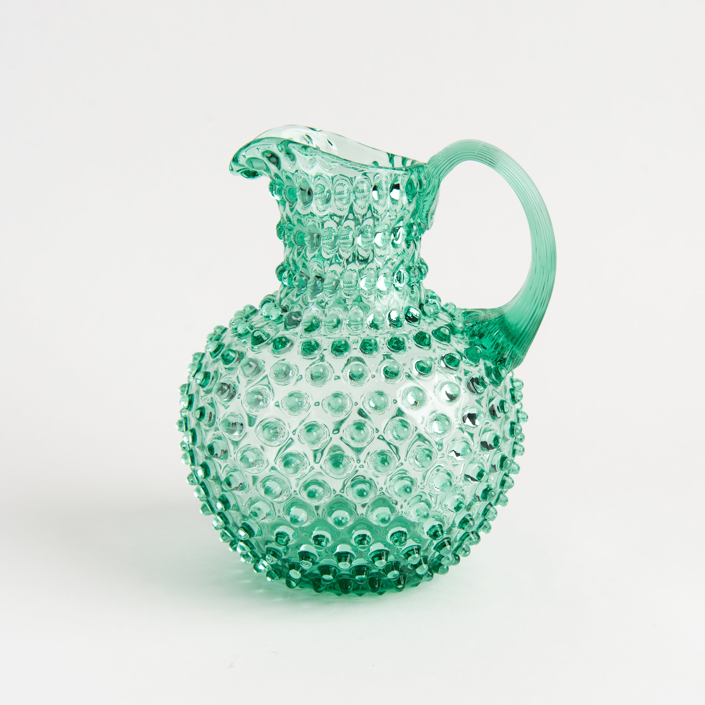 Hobnail Glass Pitcher in Capri Sea on a white background at Addison West