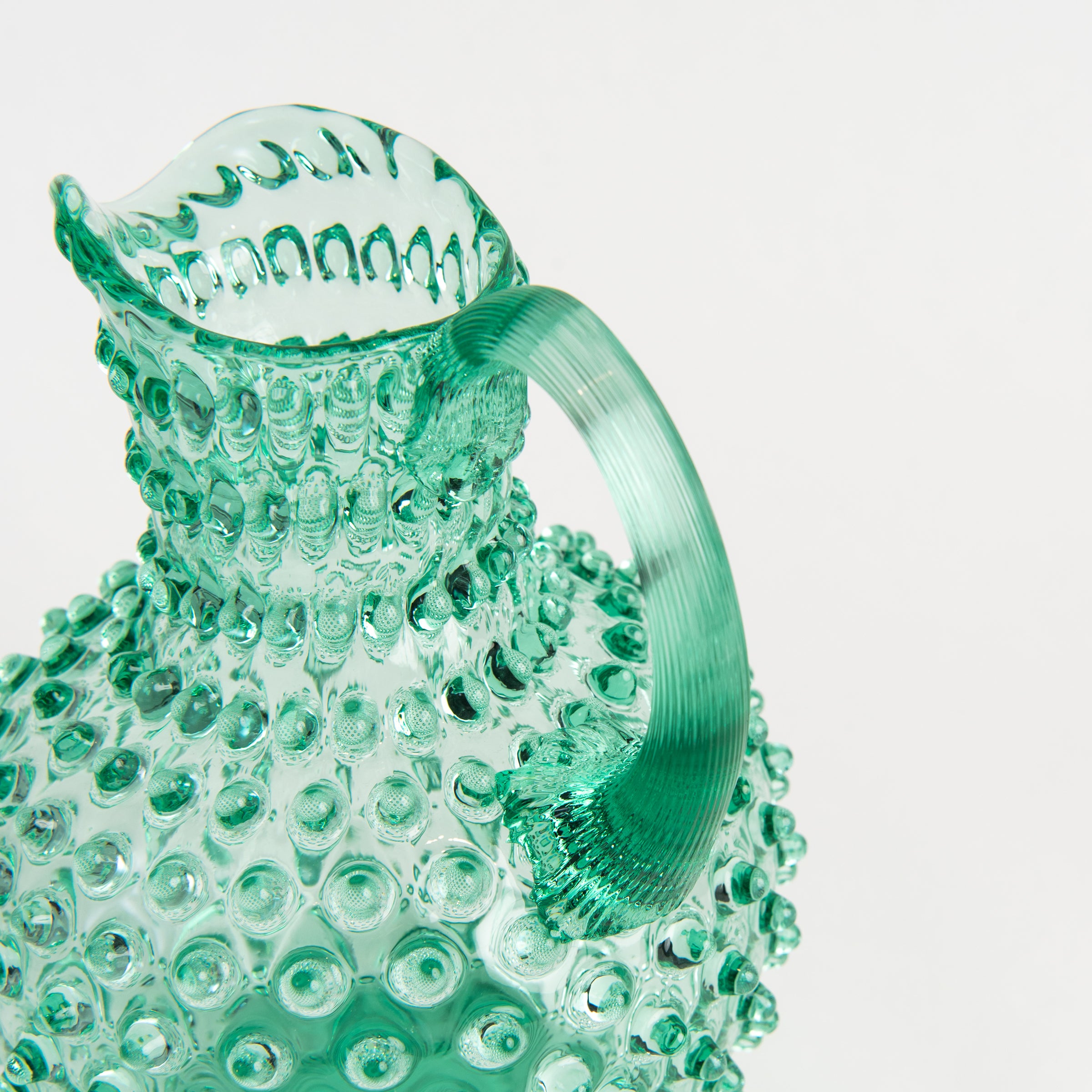 Hobnail Glass Pitcher in Capri Sea on a white background at Addison West