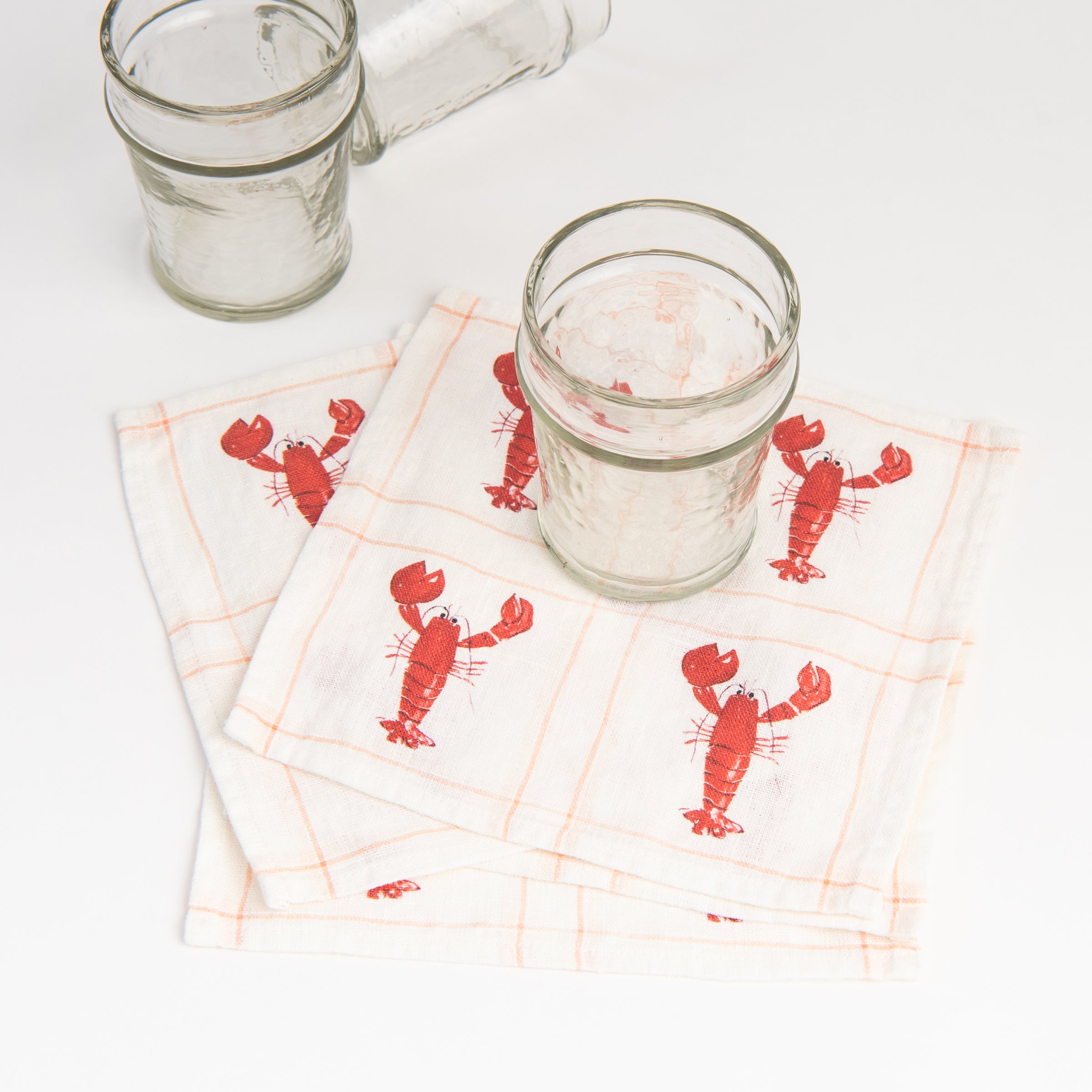 Lobster Linen Cocktail Napkins, Set of 4 on a white background at Addison West
