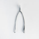 Large Silver Wishbone on a white background at Addison West