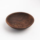 Legacy Bowl in Walnut on a white background at Addison West