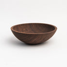 Legacy Bowl in Walnut on a white background at Addison West