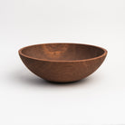 Legacy Bowl in Walnut on a white background at Addison West